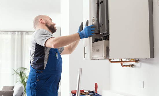 Happy client getting new boiler